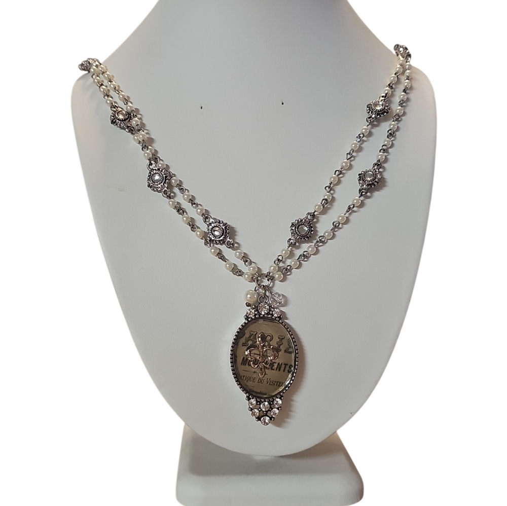 Elegant Silver and Pearl Medallion Necklace